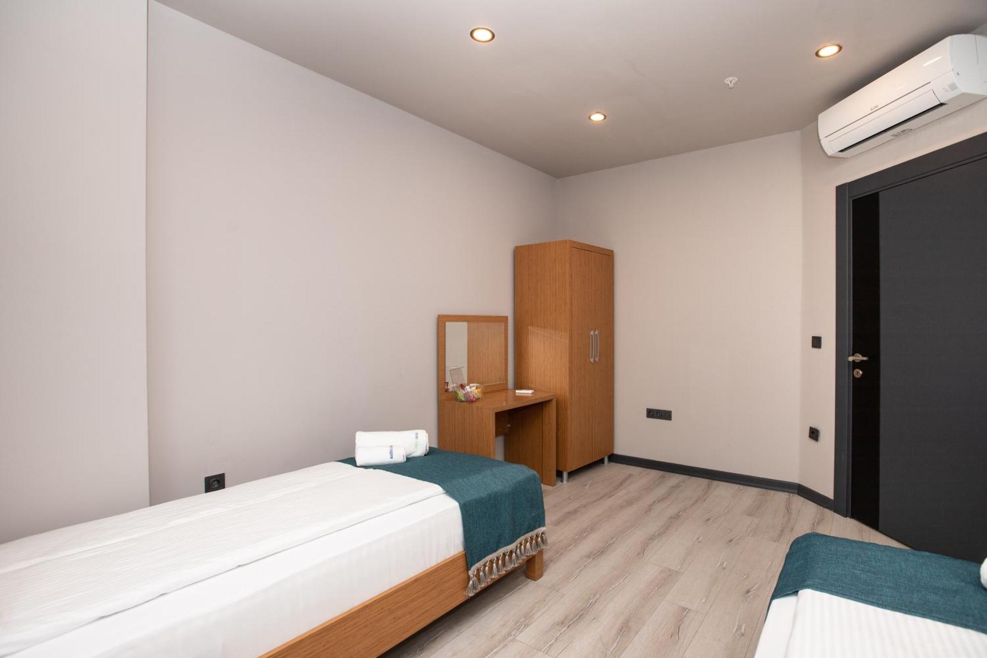 Marina Green Suite & Residence Trebizonda Quarto foto